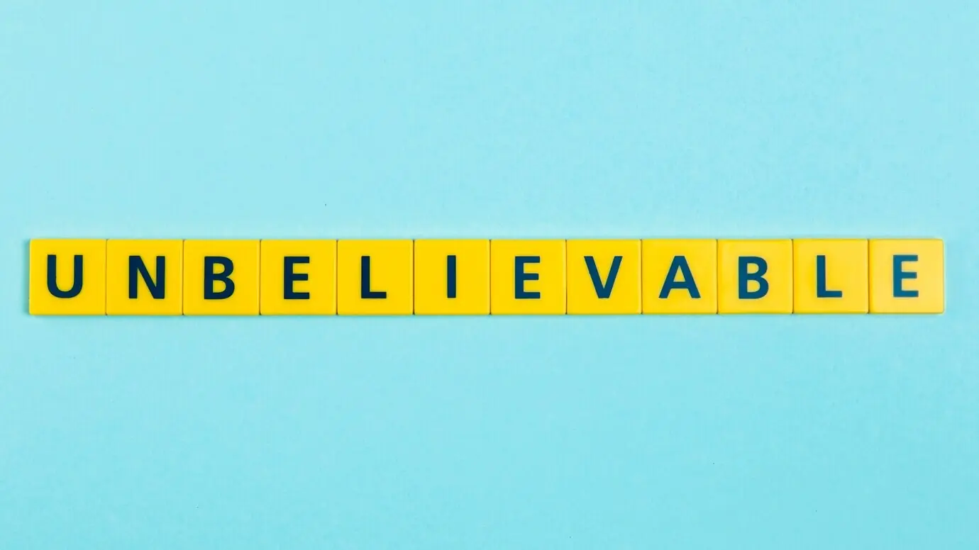 Unbelievable word displayed on scrabble tiles